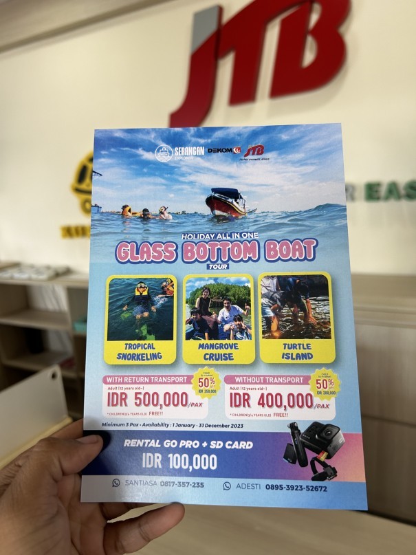 Glass Bottom Boat Tour Flyer: A colorful flyer showcasing the Serangan Explorer Glass Bottom Boat Tour in Bali, highlighting its marine life and clear waters.